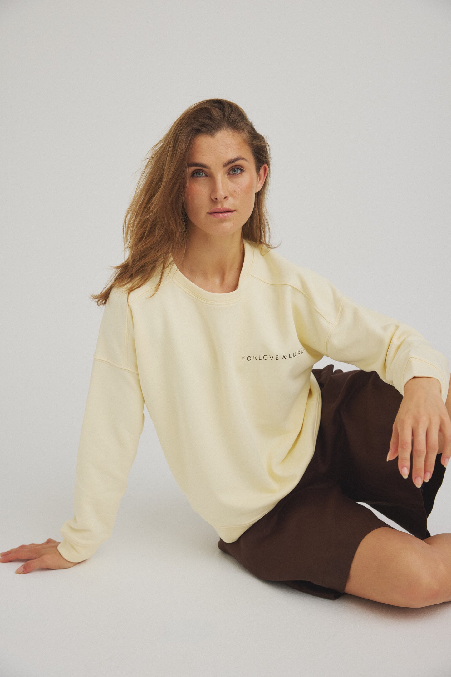 LUXZUZ // ONE TWO Lovelux Sweat Sweat 129 Pastel Yellow